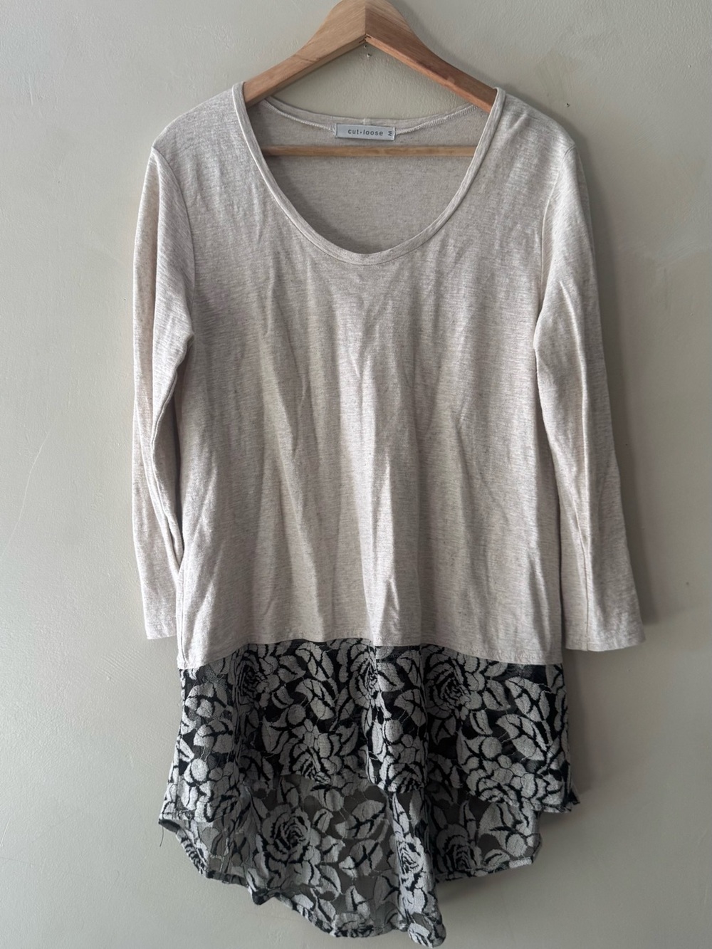 cut loose cream scoop neck top with black floral lace hem